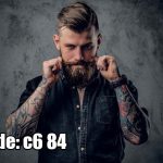 پوستر دیواری مرد هنرمند با بک‌گراند بتنی تیره | سبک صنعتی و خاص