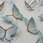 پوستر دیواری طرح پروانه های گچی رنگ نیلی